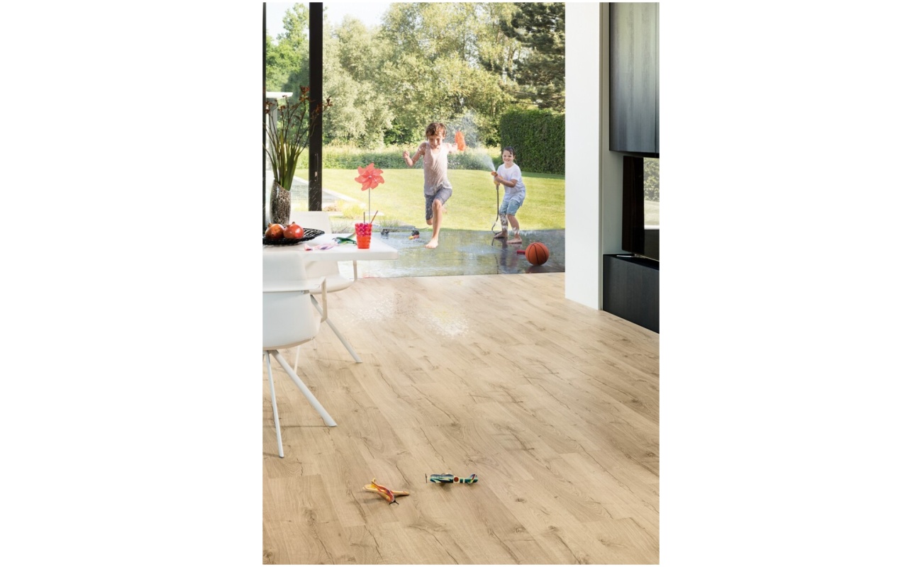 Detailfoto van de klassieke houtnerf op de Quick-Step Beige Eik laminaatvloer